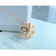 Van Cleef & Arpels Rose De Noel Of Gold/VCA Necklaces White