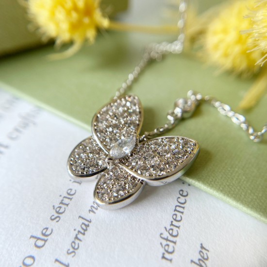 Van Cleef & Arpels Two Butterfly Of Silver And VCA Necklaces